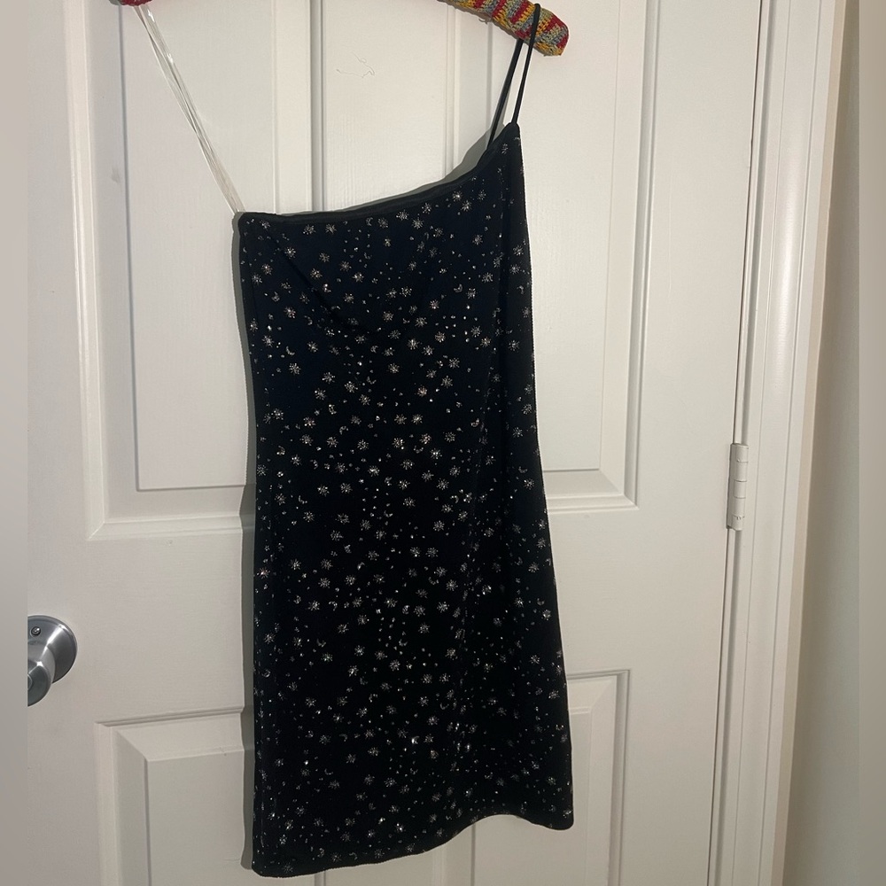 blue blush black mini dress. one shoulder. sparkle details. size L